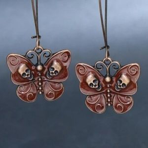 3/$25 Gorgeous butterfly skull earrings